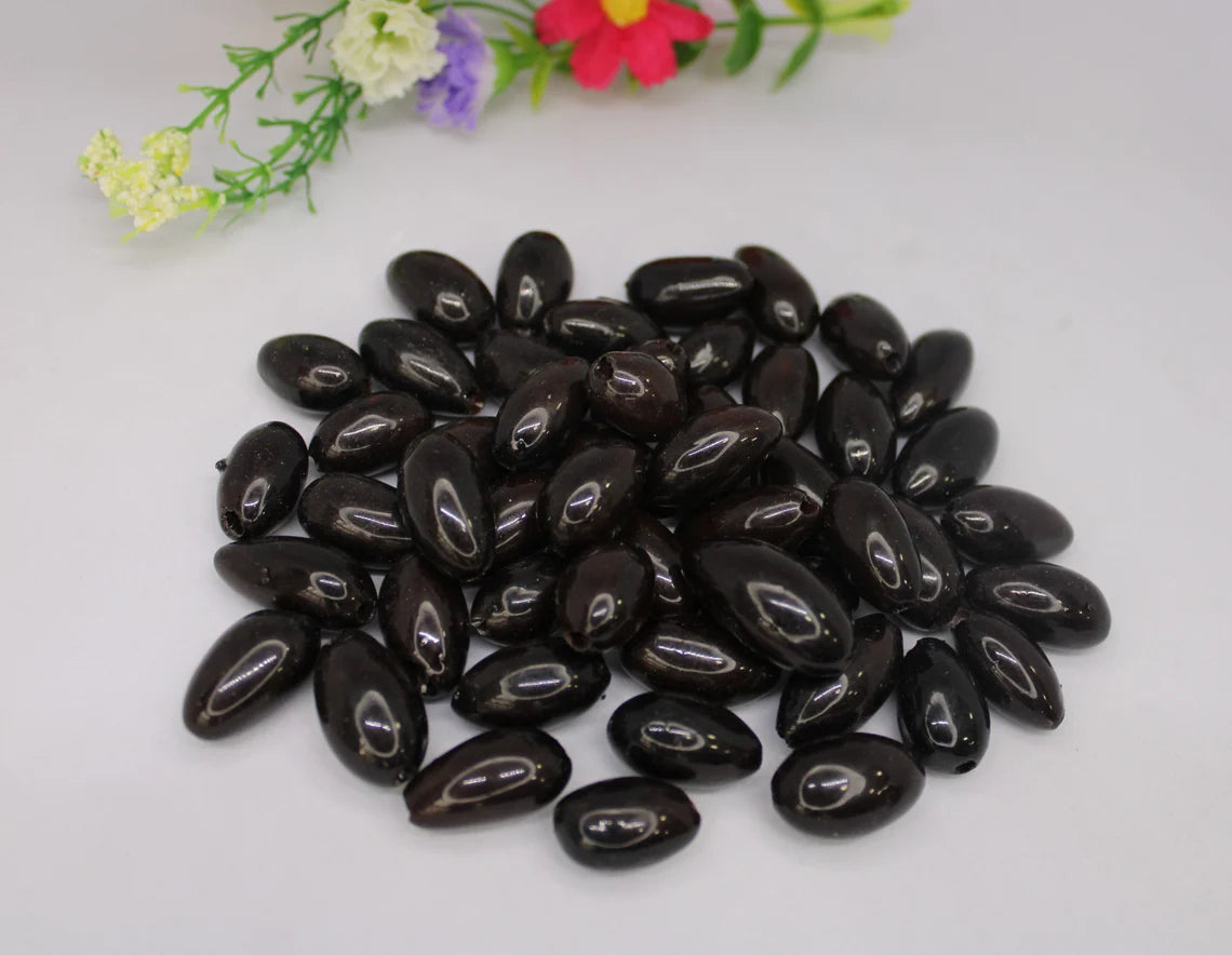Camajuro Beads. 30 Dark Brown Pieces.