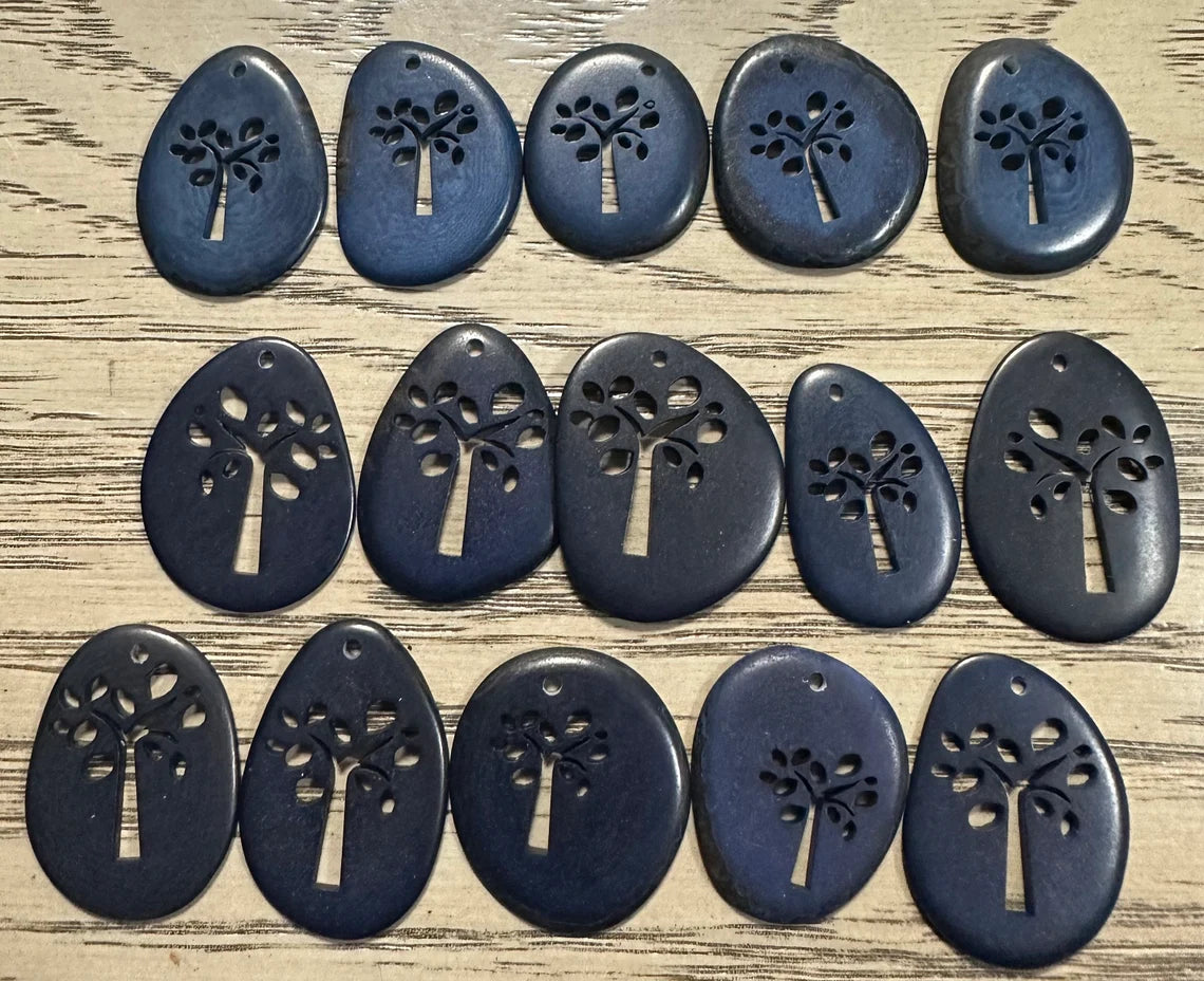 Tagua Slices Beads. 15 Blue Engraved Pieces.