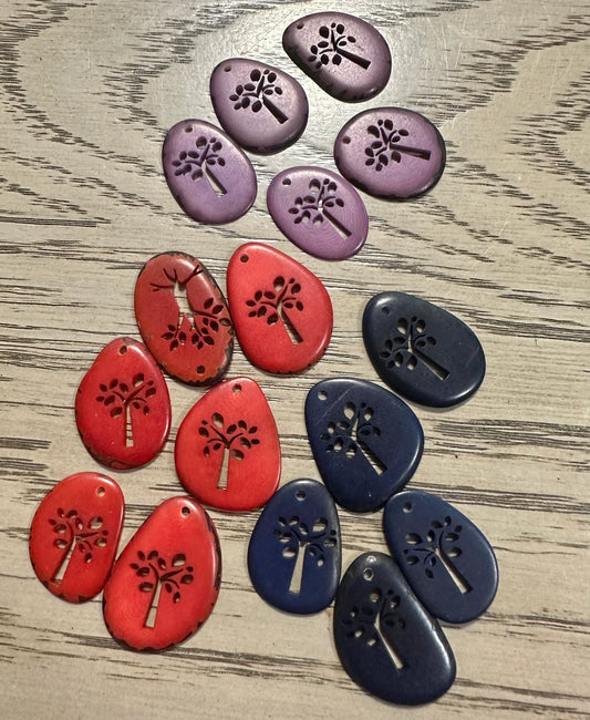 Tagua Slices Beads. 15 Multicolored Cut Engraved Pieces
