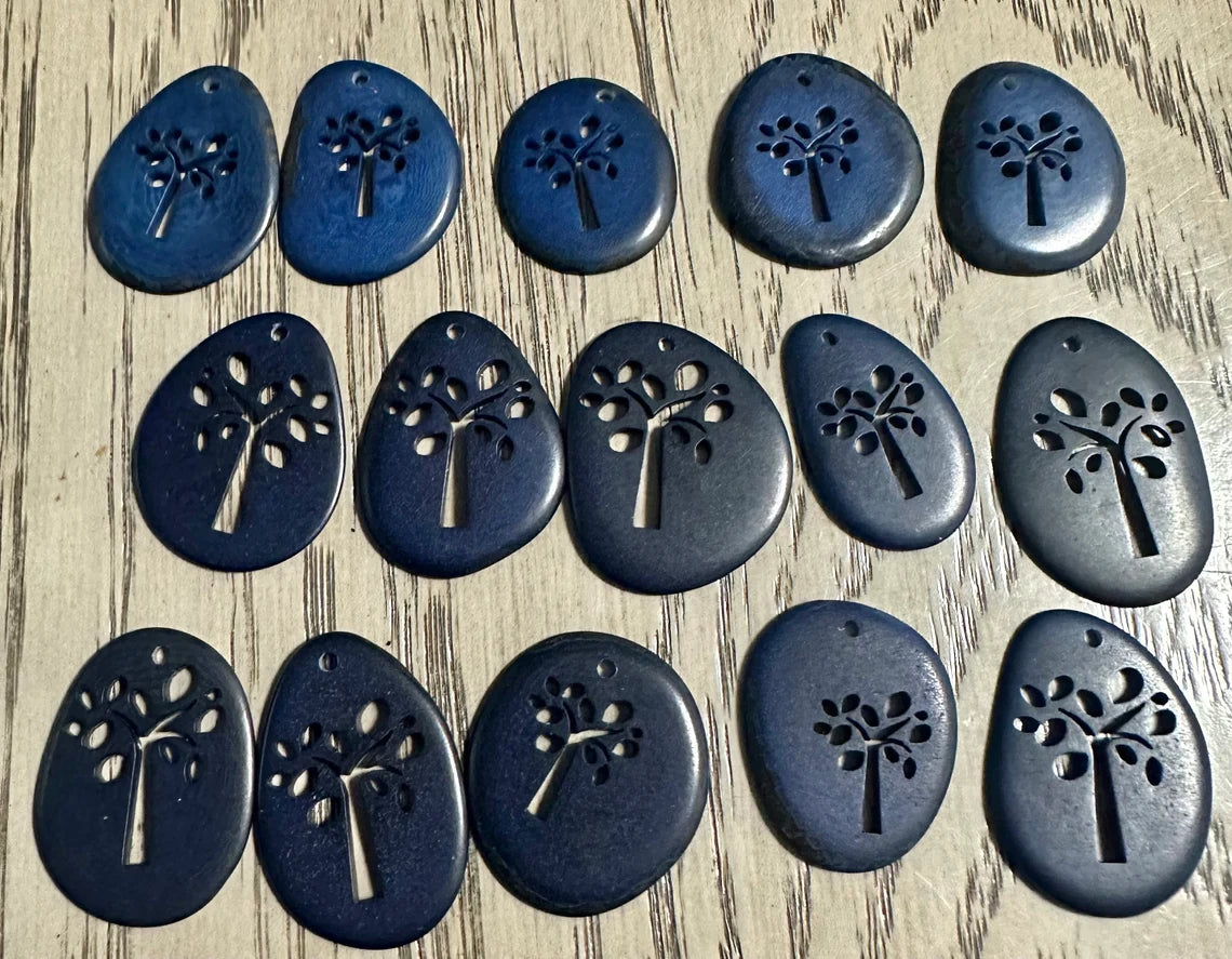 Tagua Slices Beads. 15 Blue Engraved Pieces.