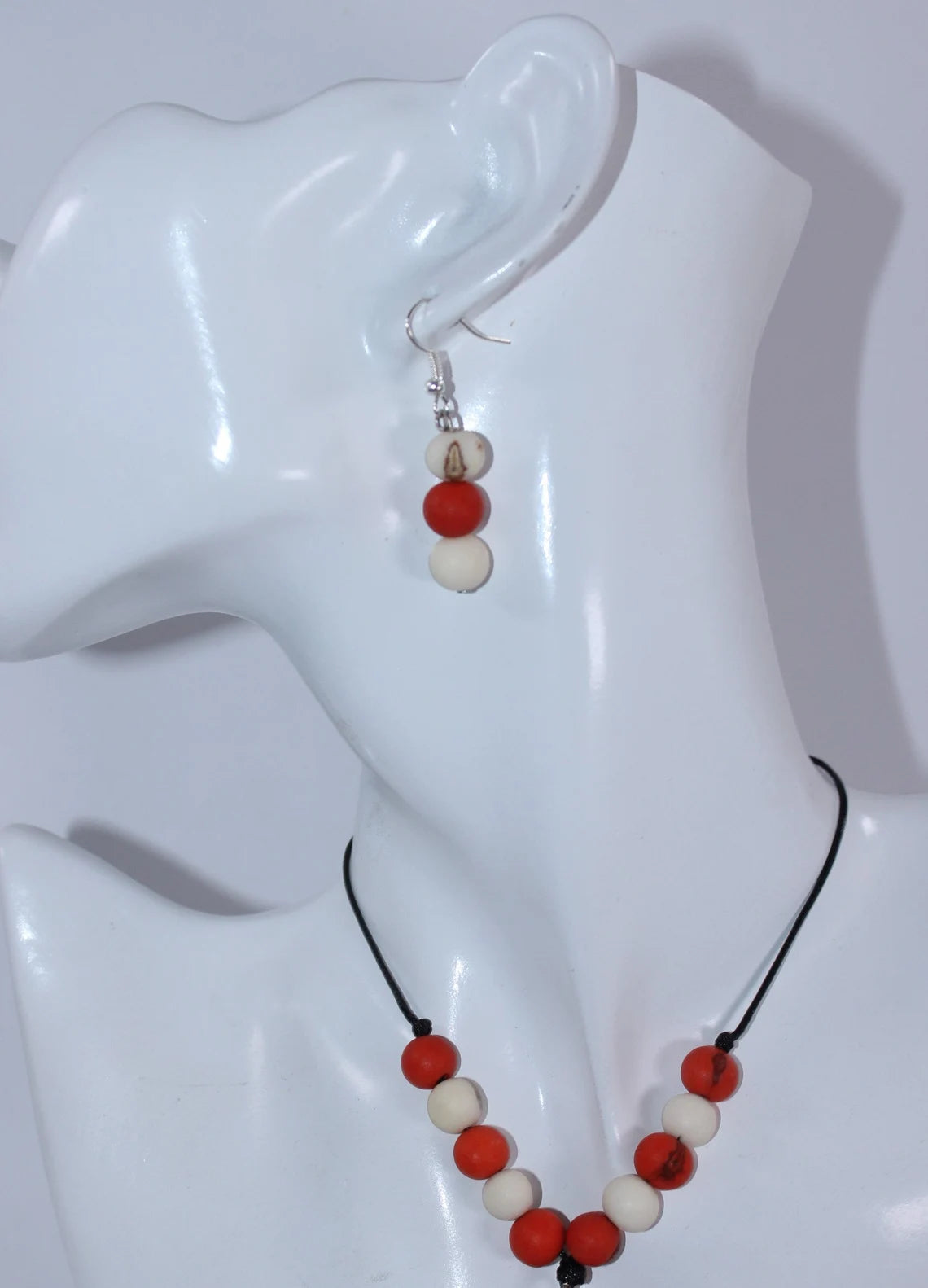 Tagua Pendant Necklace and Earrings Star Cut Set in Orange Color.
