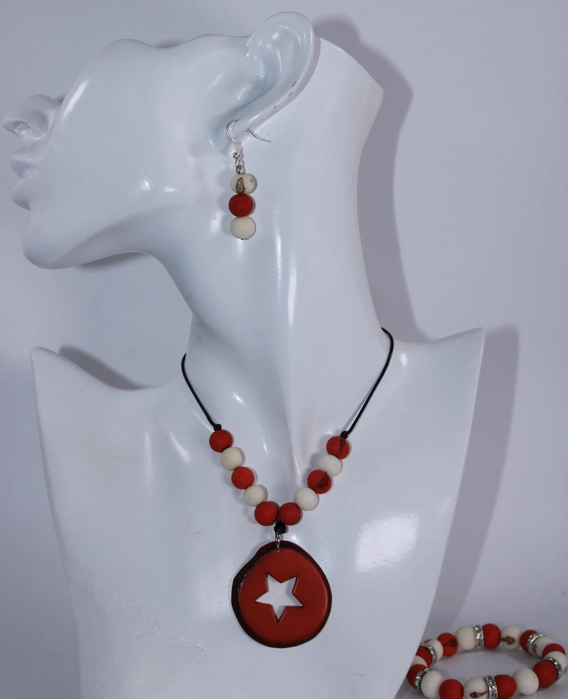 Tagua Pendant Necklace and Earrings Star Cut Set in Orange Color.