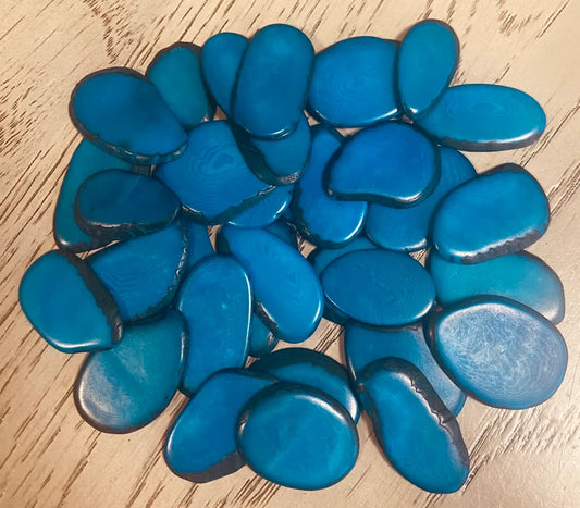 Tagua Slices Beads. 30 Blue Pieces