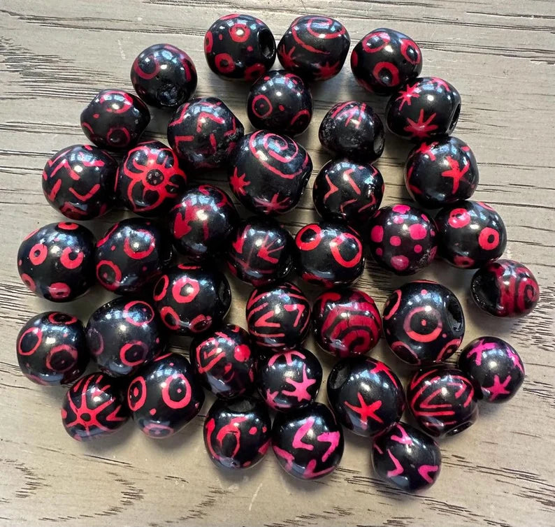 Bombona Ball Beads. 25 Black and Pink Patterned Pieces.