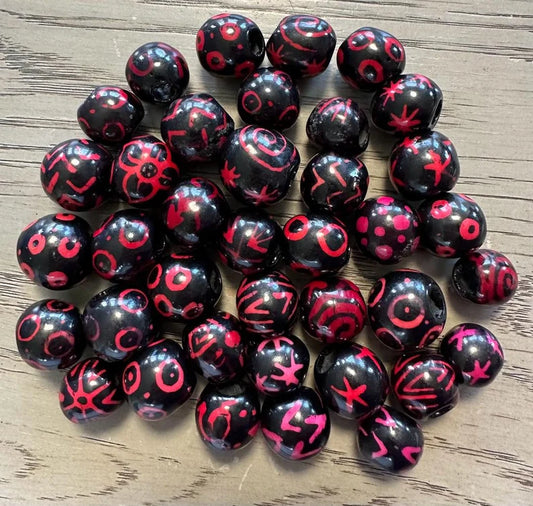 Bombona Ball Beads. 25 Black and Pink Patterned Pieces.