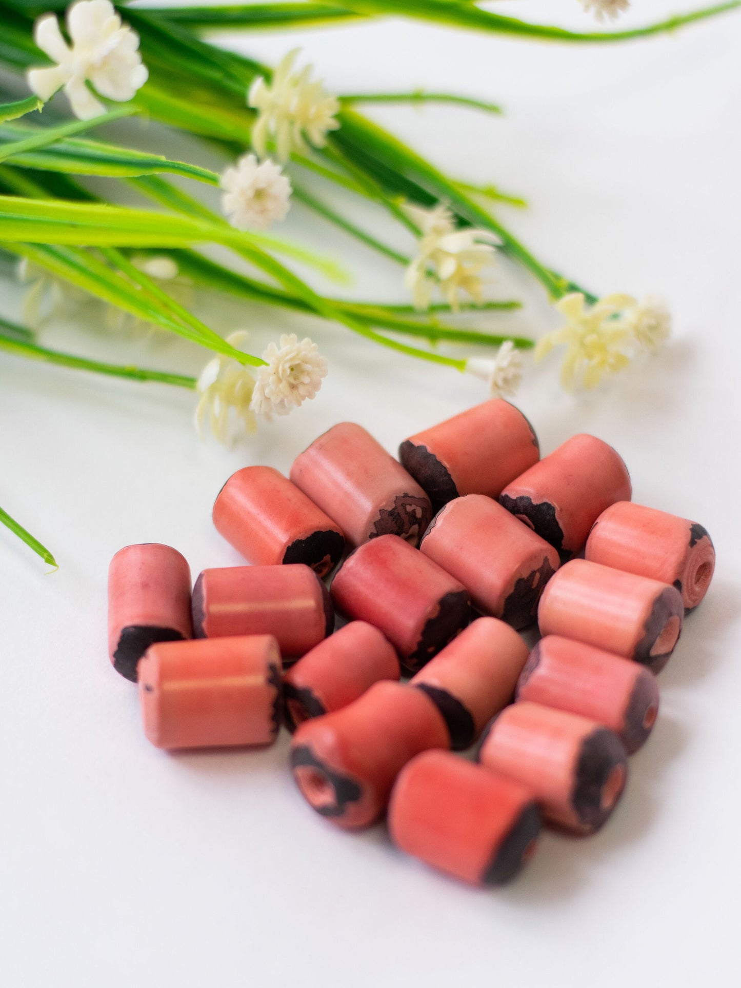 Tagua Irregular Cylinder Beads. 15 Salmon Pieces