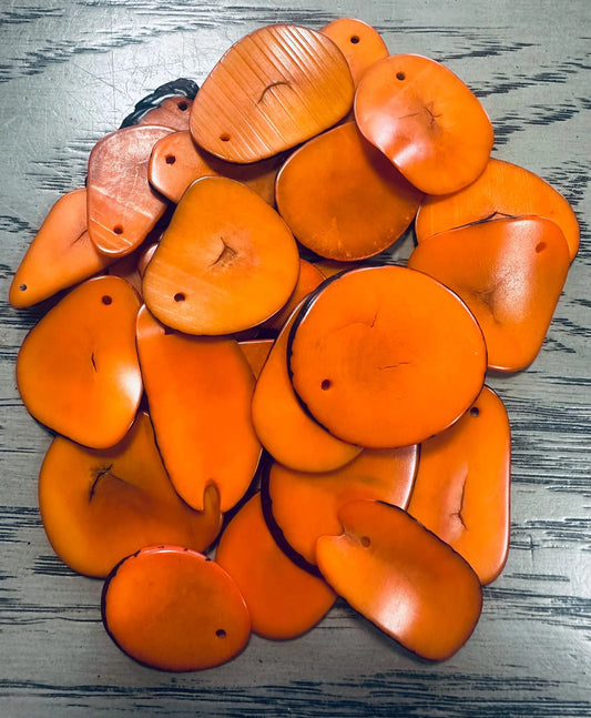 Tagua Slices Beads. 30 Orange Pieces