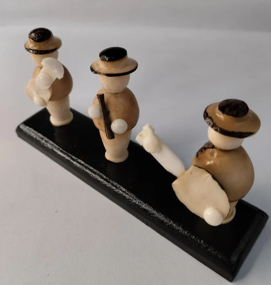 Little musical men made in tagua. Handmade. Object to decorate.