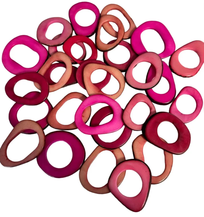 Tagua rings. Mix of pink: mangenta, pale pink & fuchsia beads, hoops, donuts, rings, discs. 20 pieces of tagua. Drilled or Undrilled.