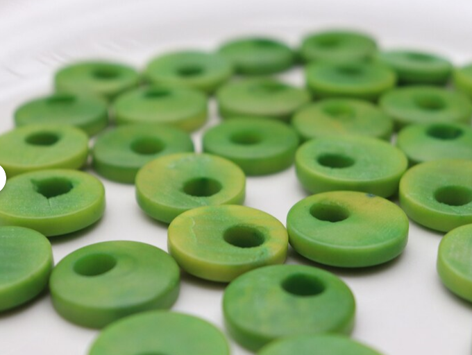 Tagua Beads Donut Shape. Tagua Discs In Green. 15 Tagua Donut Beads Undrilled. Size: 0.7 inch x 0.7 inch. Jewerly Supplies