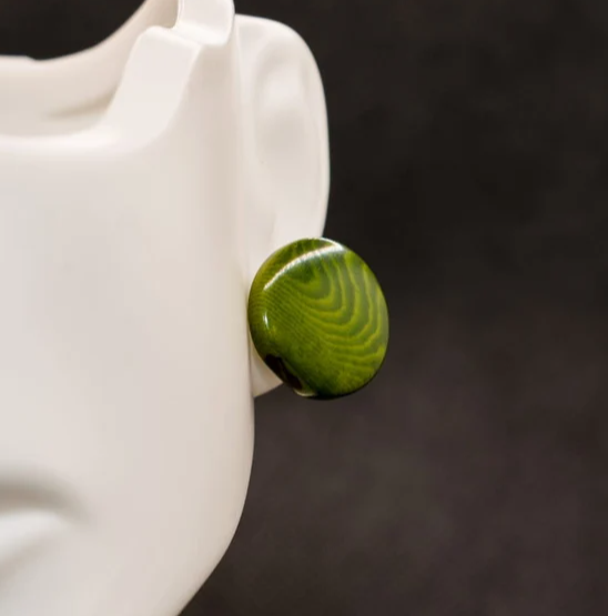 Round statement green stud earrings. Handmade with tagua, vegetable ivory nut. Eco-friendly, organic, natural, ethical & sustainable jewelry