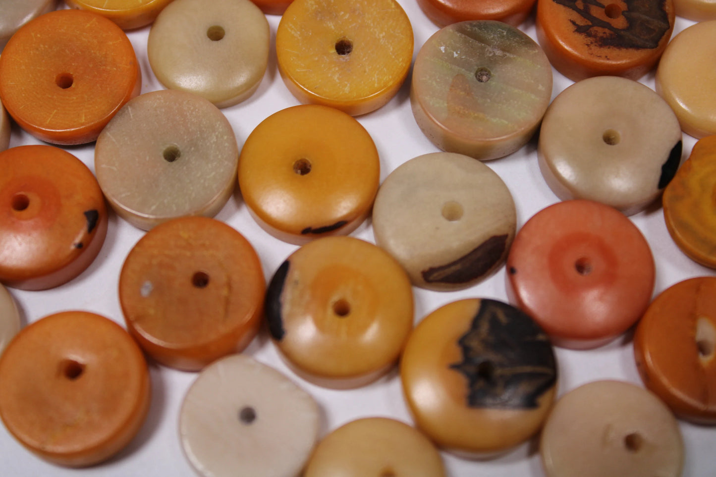 Tagua Donut Beads. 36 Mini Orange and Beige Pieces.