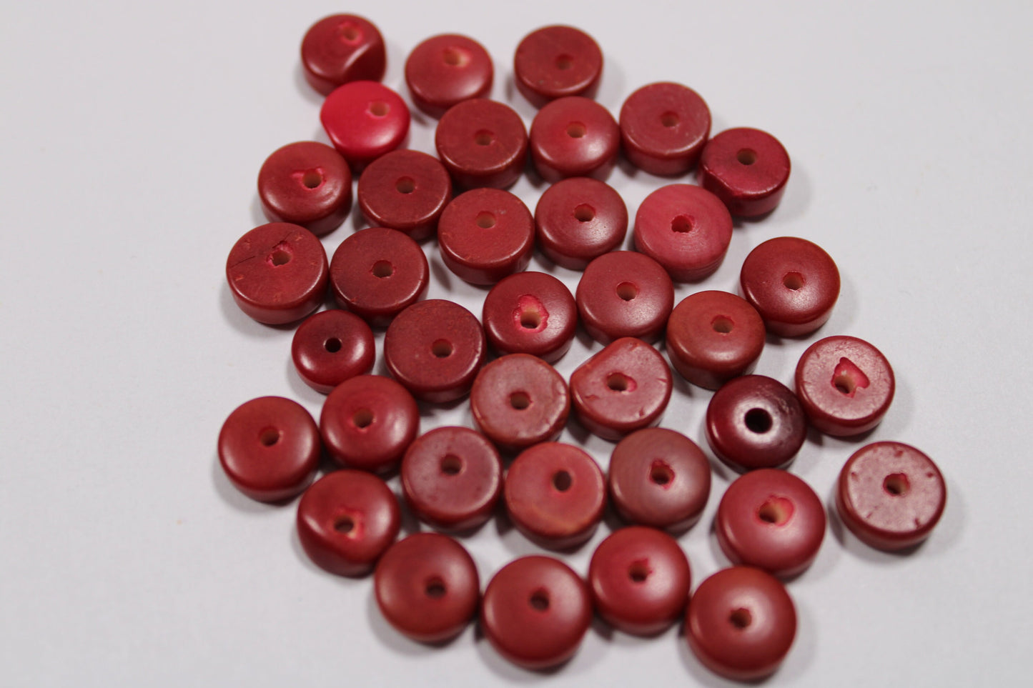 Tagua Donut Beads. 32 Mini Red Pieces.