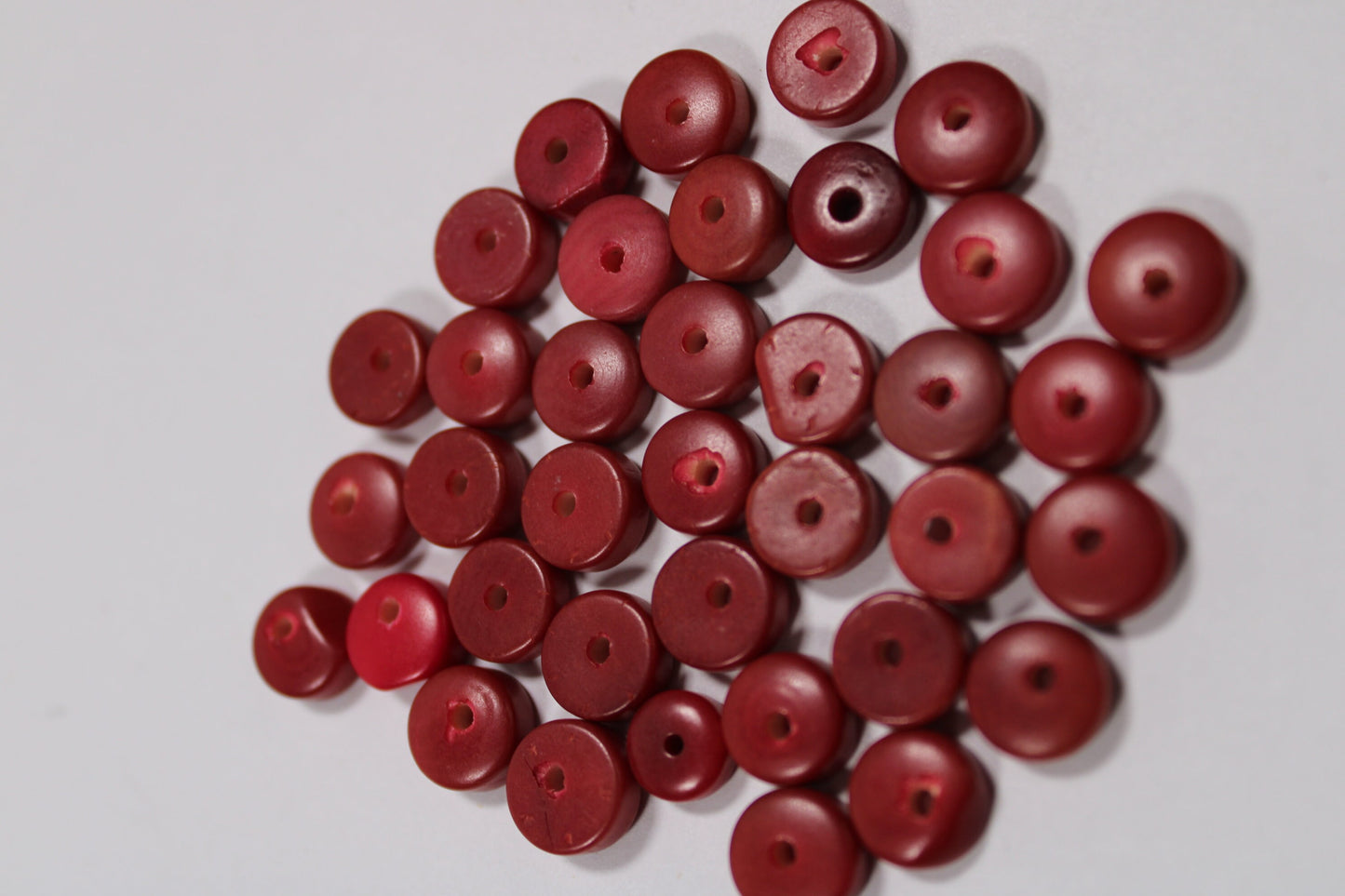 Tagua Donut Beads. 32 Mini Red Pieces.