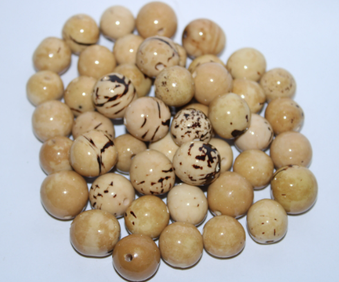 30 Bombona balls from Colombia. Beige Bombona Unpolished / Matte. Jewelry Making. It’s punctured straight through. TBBeige01