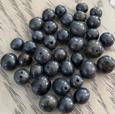 30 Bombona Balls From Colombia, Polished. Black Bombona Seeds. It’s punctured straight through. TBBlack02