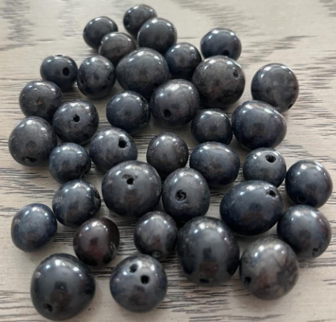 30 Bombona Balls From Colombia, Polished. Black Bombona Seeds. It’s punctured straight through. TBBlack02