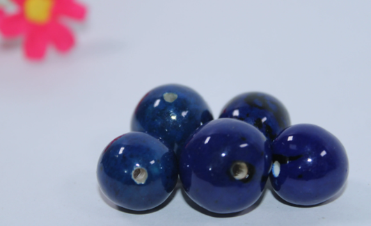 20 Bombona Balls from Colombia, Polished. Dark blue Bombona Seeds. It’s Punctured Straight Through. TBBlue01