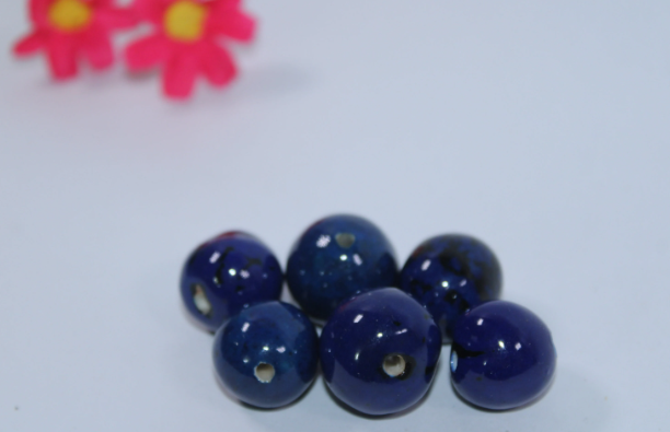 20 Bombona Balls from Colombia, Polished. Dark blue Bombona Seeds. It’s Punctured Straight Through. TBBlue01