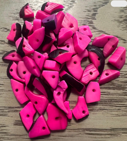 Mini tagua nuts, 100 pieces on Fuchsia beads. Size: approximately 1-2 cm. Center hole. Ideal for eco-friendly jewelry making. TBTFuchsia01