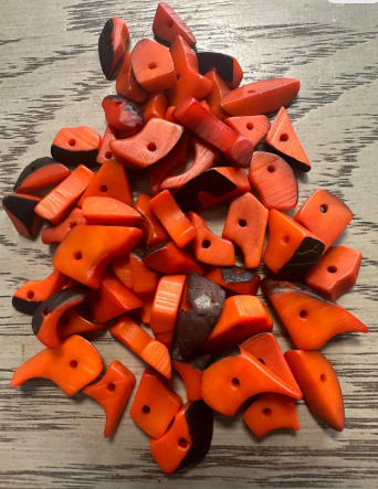 Mini tagua nuts, 100 pieces on Orange beads. Size: approximately 1-2 cm. Center hole. Ideal for eco-friendly jewelry making. TBTOrange02