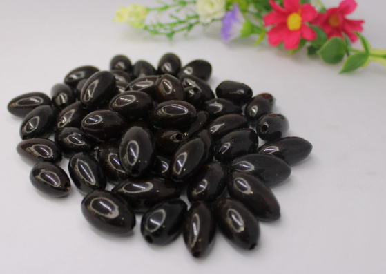 Dark Brown Beads Made of camajuro Seeds Resin-Coated. Size: 2.5 x 1.5 cm. Approx. Drilled. Natural Beads. Pack of 30 Beads. TCBrown01
