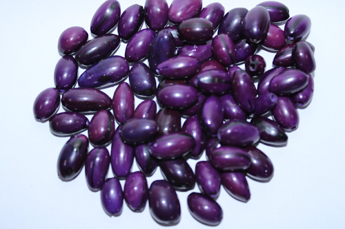 Dark Purple made of camajuro seeds from Colombia. Size: 2.5 x 1.5 cm. approx. Drilled. Natural Beads. Pack of 30 Beads. TCPurple03