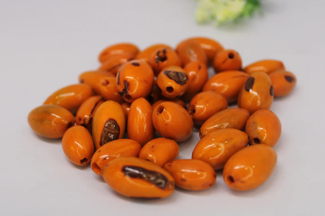 Camajuro Beads. 30 Orange Pieces.