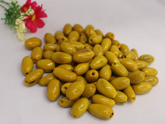 Beads Made of Camajuro Seeds in Yellow Color. (30 Pieces)