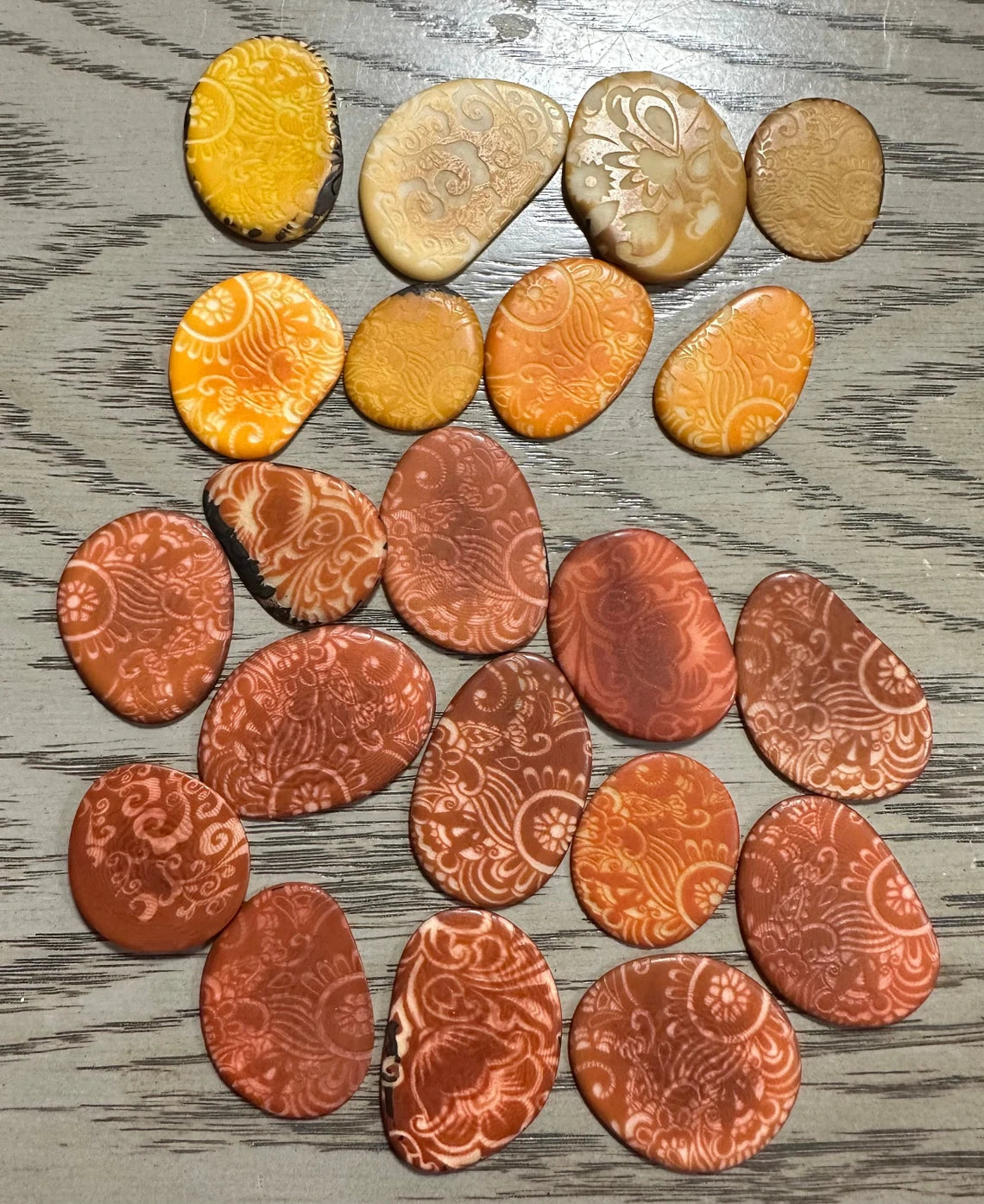 Tagua Slices Beads. 20 Orange and Yellow Engraved Pieces.