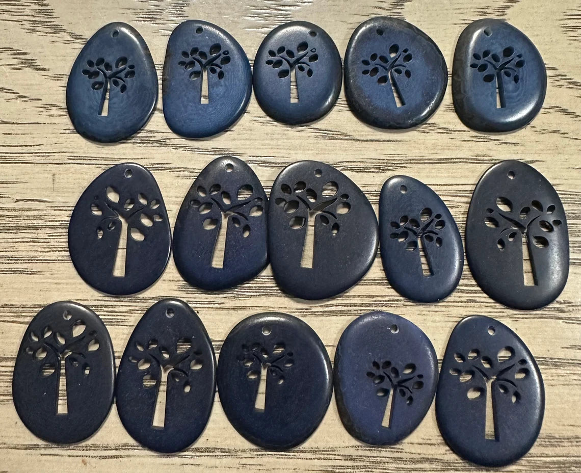 Tagua Slices Beads. 15 Blue Cut Engraved Pieces.