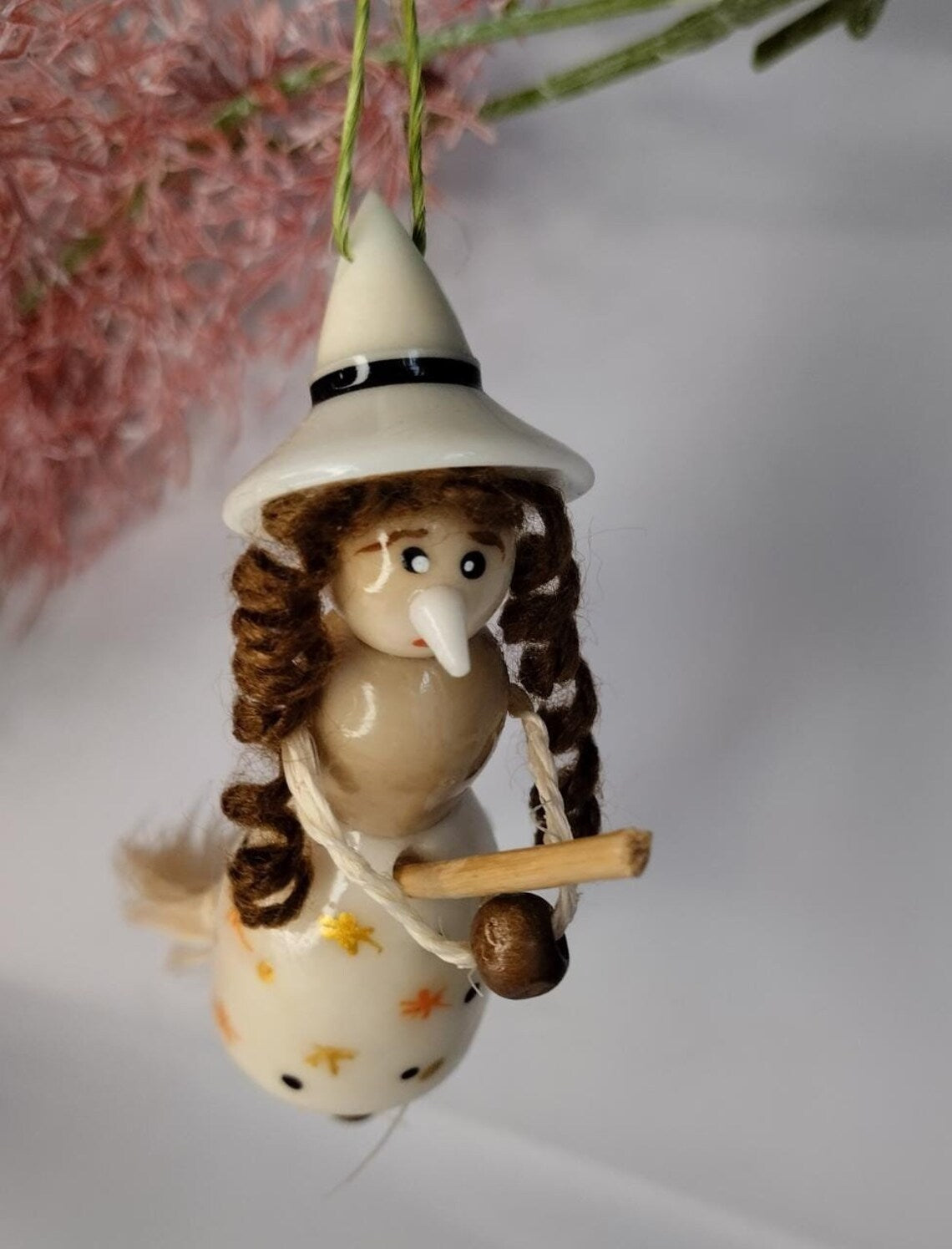 Little witch in tagua. Handmade. Object to decorate.