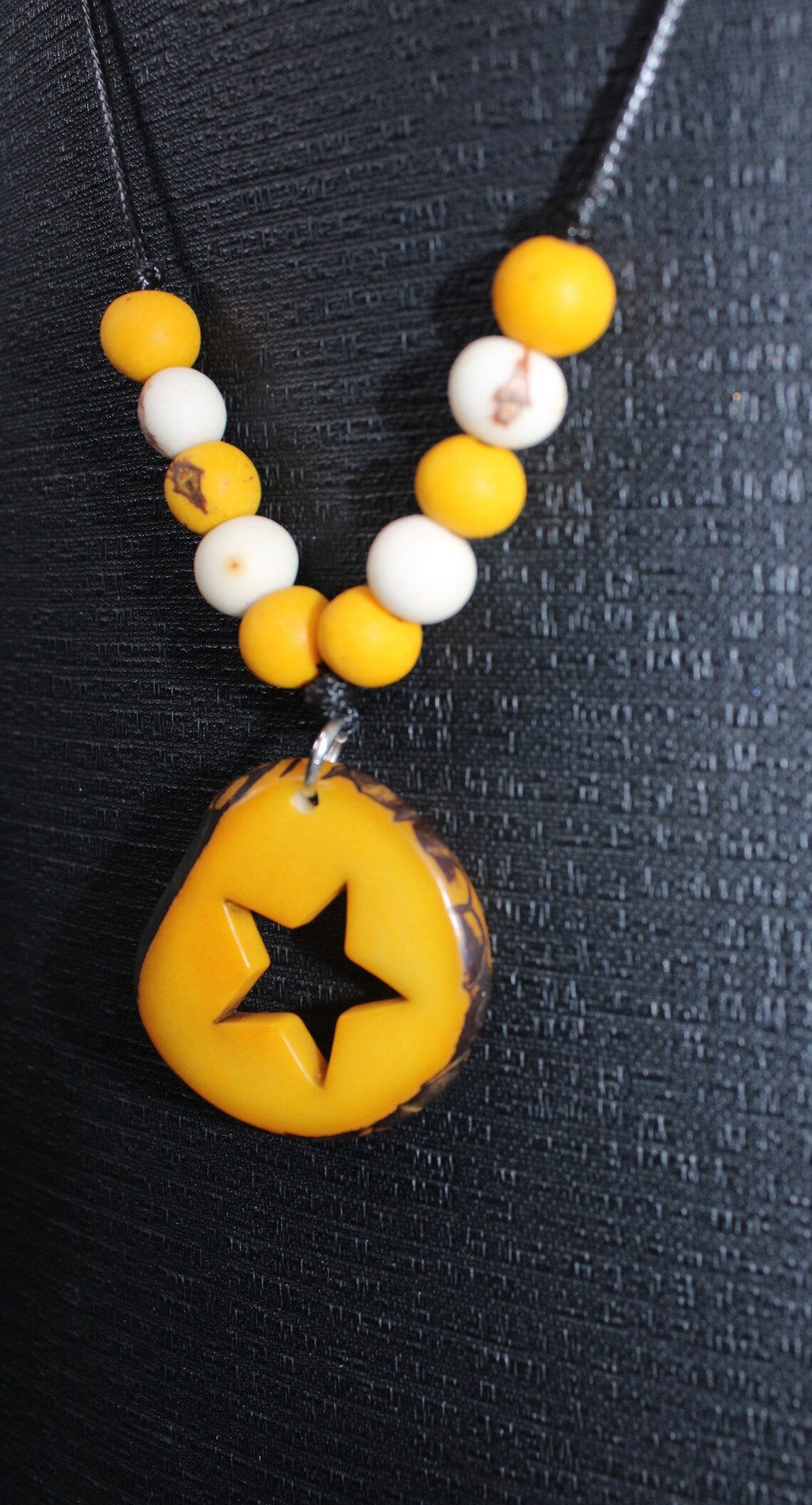 Tagua Pendant Necklace and Earrings Star Cut Set in Yellow Color.