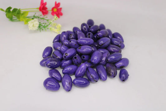 Beads Made of Camajuro Seeds in Purple Color. (30 Pieces)