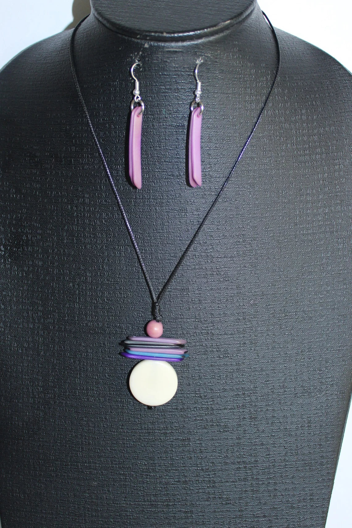 Tagua Pendant Necklace and Earrings Set in White and Purple Color.