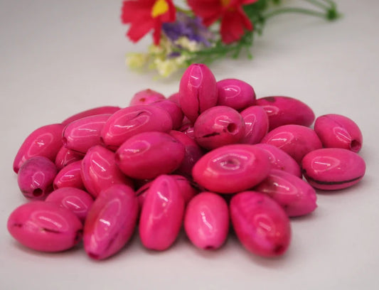 Beads Made of Camajuro Seeds in Pink Color. (30 Pieces)