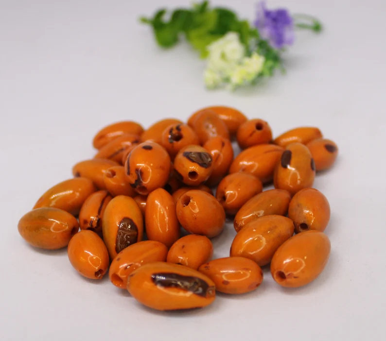 Camajuro Beads. 30 Orange Pieces.