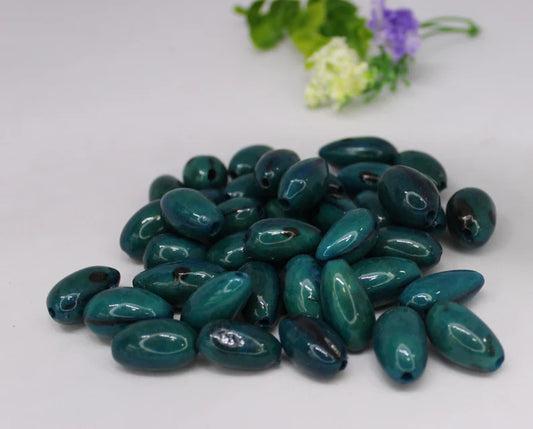 Beads Made of Camajuro Seeds in Turquoise Color. (30 Pieces)