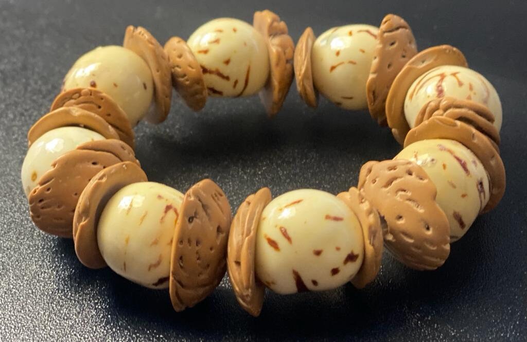 Sustainable Jewelry Eco-Friendly Exotic Unique Bracelet Lilac and Purple Stretch Bracelet Handmade in Colombia with Peach and Bombona Seeds