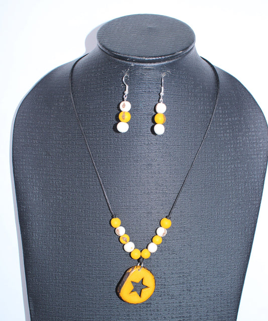 Tagua Pendant Necklace and Earrings Star Cut Set in Yellow Color.