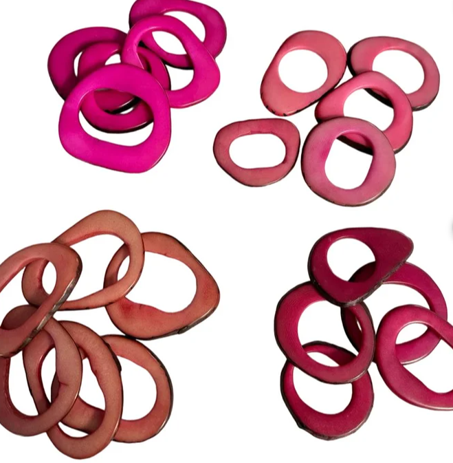Tagua rings. Mix of pink: mangenta, pale pink & fuchsia beads, hoops, donuts, rings, discs. 20 pieces of tagua. Drilled or Undrilled.