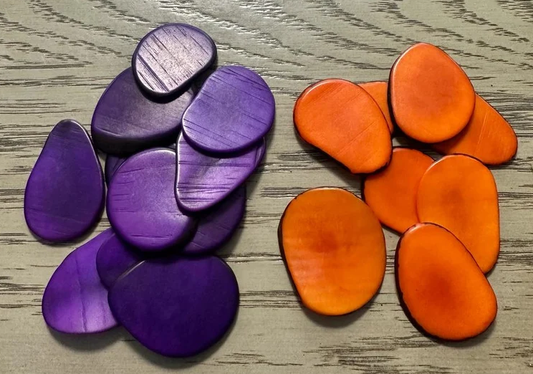 Tagua Slices. Mix of 40 Purple and 40 Orange Slices. 80 Tagua Beads. Size: 4x3 cm. approx. Vegetable ivory nut. Drilled or Undrilled