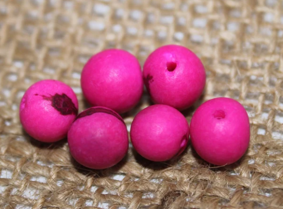 Pink beads Acai seeds from the Colombian Amazonian palm. Size: 1x1cm. Hole size 1mm approx. natural accounts. Pack of 200 beads.
