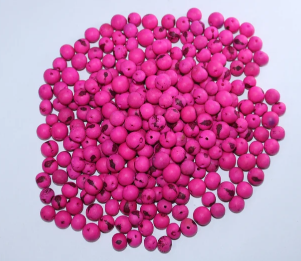 Pink beads Acai seeds from the Colombian Amazonian palm. Size: 1x1cm. Hole size 1mm approx. natural accounts. Pack of 200 beads.