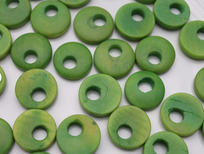 Tagua Beads Donut Shape. Tagua Discs In Green. 15 Tagua Donut Beads Undrilled. Size: 0.7 inch x 0.7 inch. Jewerly Supplies