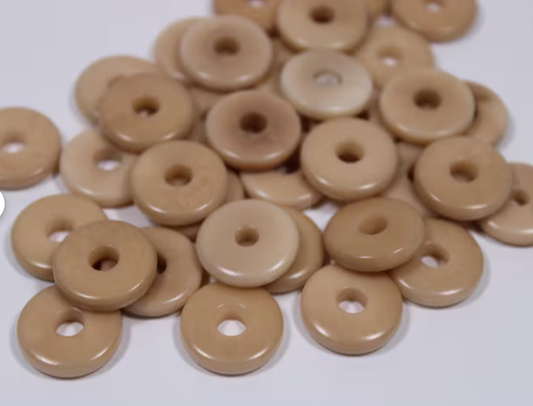 25 discs of tagua discs in beige color. Center drilled. Size: 1.5 cm. approx. Natural Jewelry Making Supplies from Colombia
